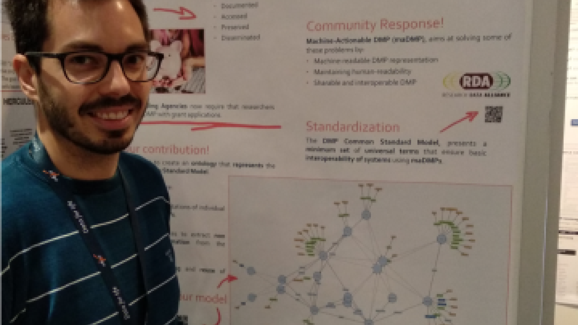 João Cardoso and his poster "An Ontology for the DMP Common Standard Model"