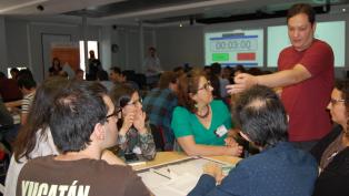 Photo of Data Stewards course trainer with trainees during activity